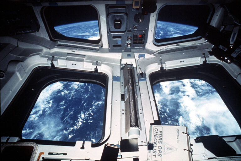 The view out the overhead and aft windows of the Space Shuttle, one of the images Jay Apt can show as an astronaut speaker.