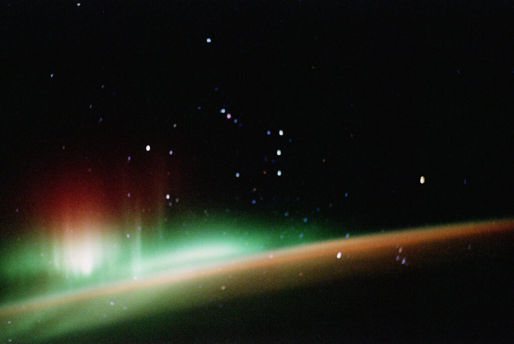 The southern aurora and Orion taken by Jay Apt on STS-59, one of the images Jay Apt can show as an astronaut speaker.