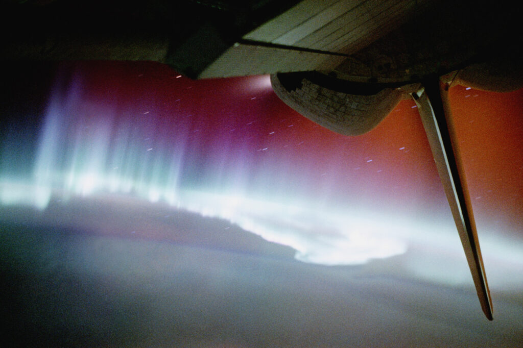 The southern lights and Endeavor thruster firing on STS-59, one of the images Jay Apt can show as an astronaut speaker.