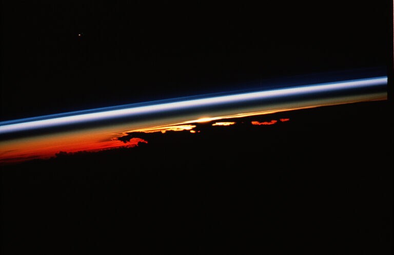 Sunset over the Pacific on STS-47, one of the images Jay Apt can show as an astronaut speaker.